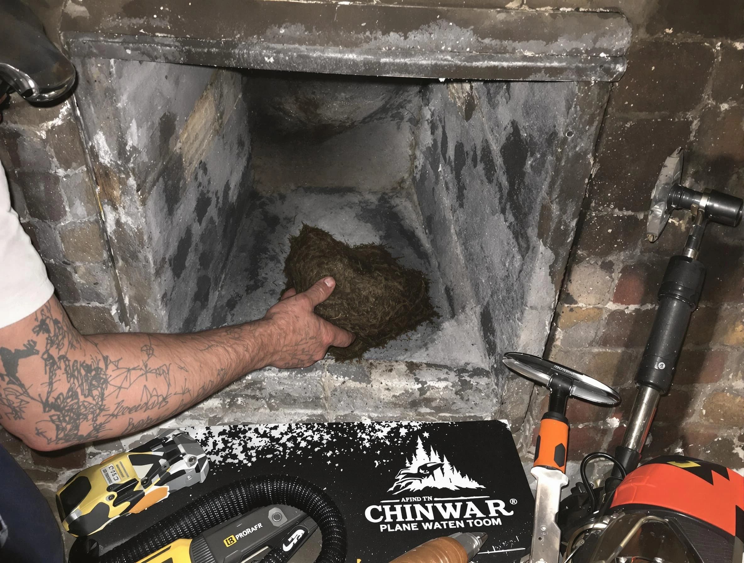 Monroeville Chimney Sweep safely removing debris and screening chimney in Monroeville, PA