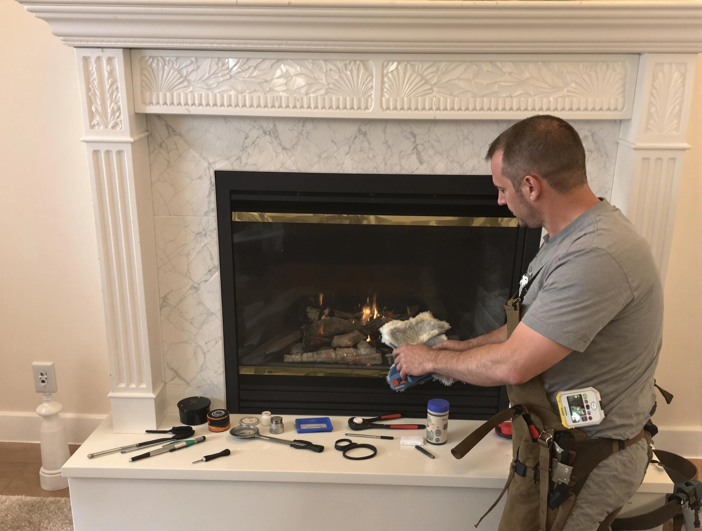 Monroeville Chimney Sweep performing fireplace maintenance in Monroeville, PA